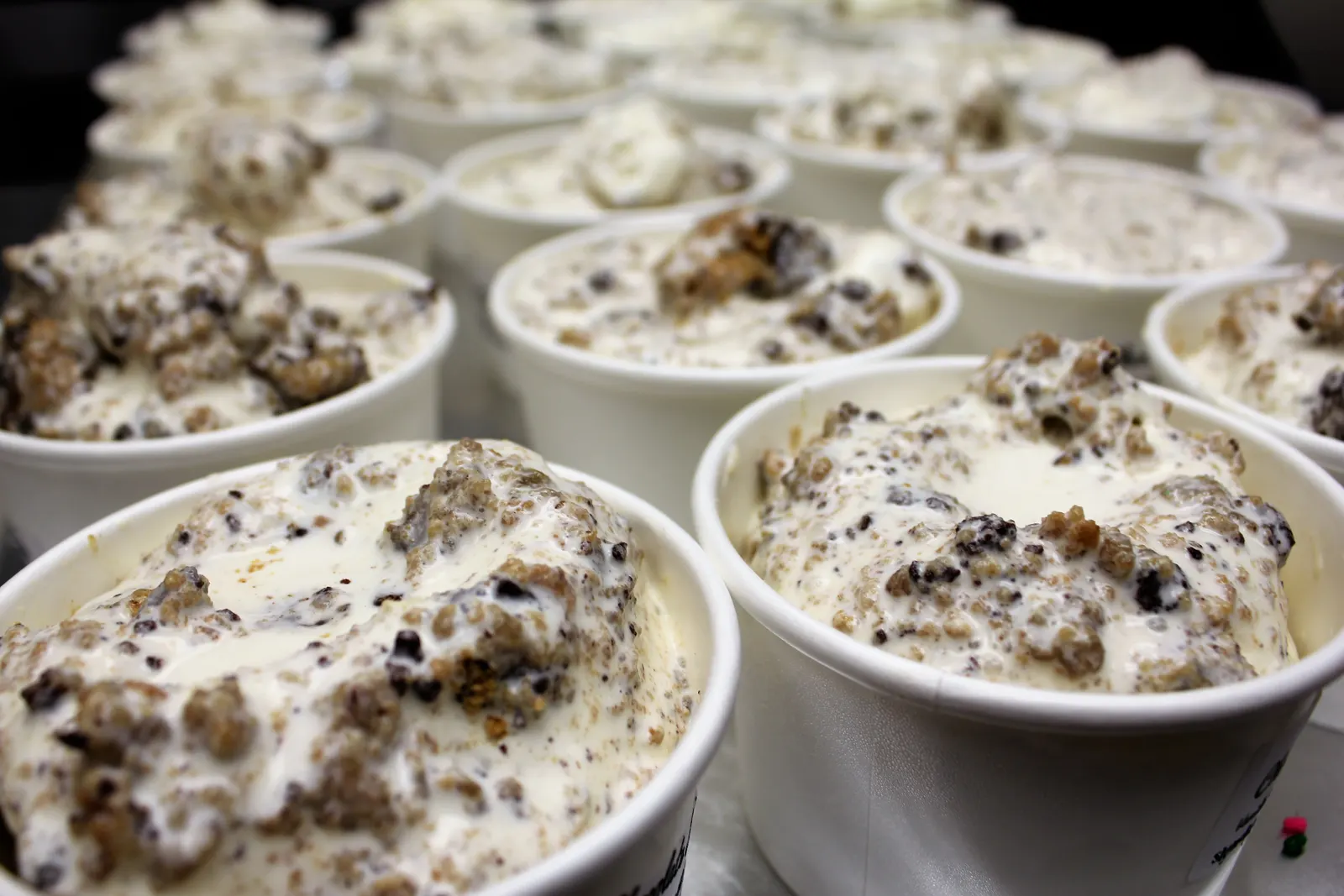 Cups of homemade cookies-and-cream ice cream